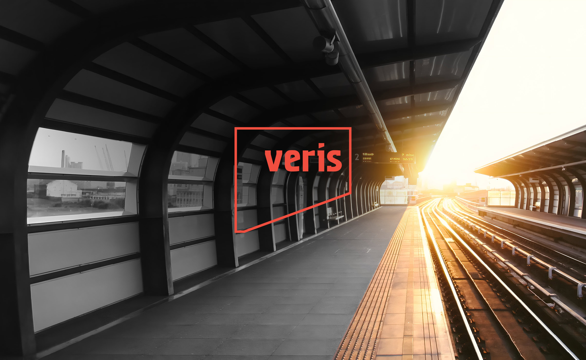 Veris logo on front of train track